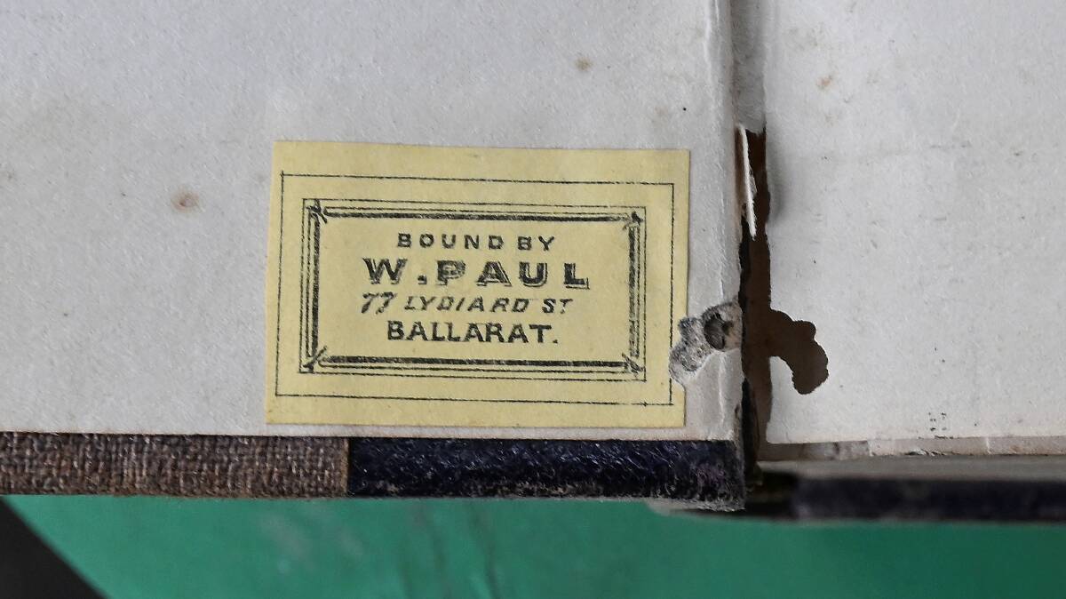 The label on the inside of the book revealed it was bound 150 years ago on Lydiard Street. Photo by Lachlan Bence