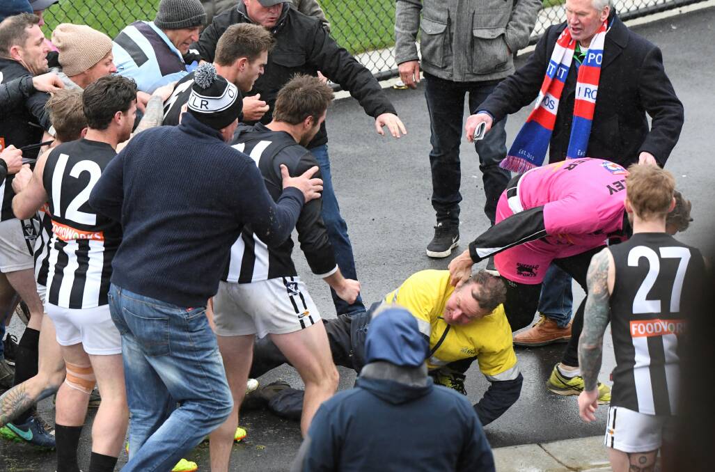 The brawl that broke out between a supporter and Darley players. Photo: Lachlan Bence.