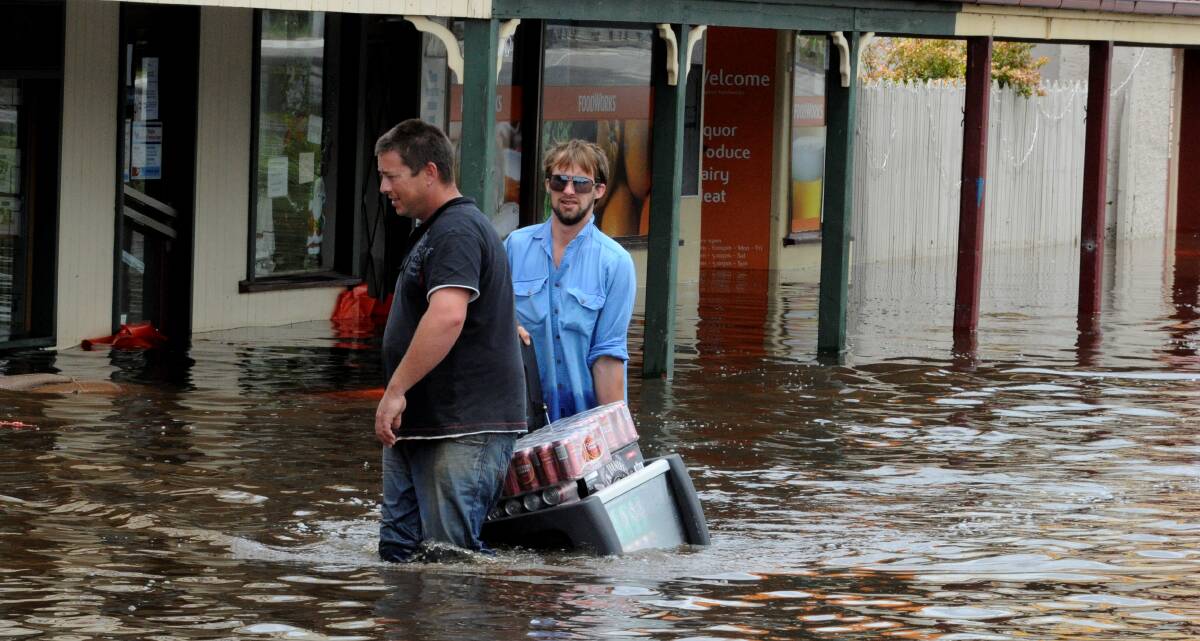 ESSENTIALS: Skipton Hotel licensee Josh Nixon and his mate Terry Coad rescue the beer from the bottle shop