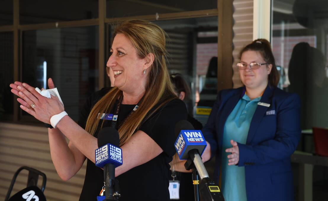 Ballarat Specialist School principal Karen Biggelaar became emotional but was all smiles when hearing the news. Photo: Kate Healy.