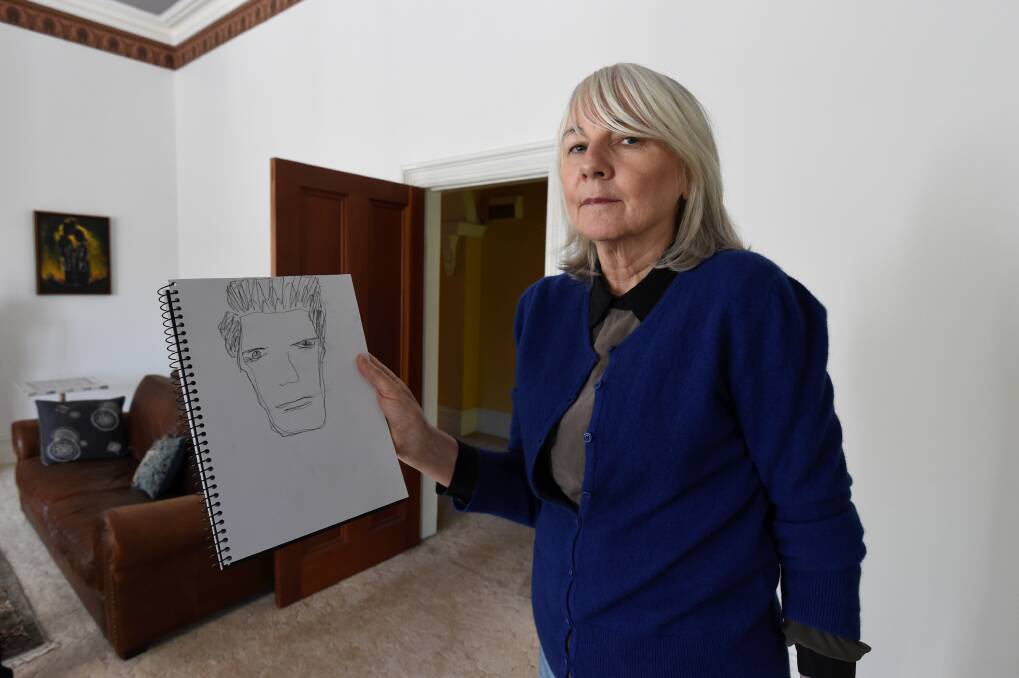 Dr Rosemary Draper with the sketch she drew. Photo: Lachlan Bence.
