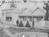 Two men and two women outside a weatherboard building and a shop named "The Race Store", 1860. Fom left: James Harris, his sister Eliza Harris, Mary-Anne Bennet (nee Harris) and her husband and the shop owner, James Bennett. The shop was on the corner of Barkly and Bradshaw Streets. SOURCE: THE BALLARAT HISTORICAL SOCIETY.