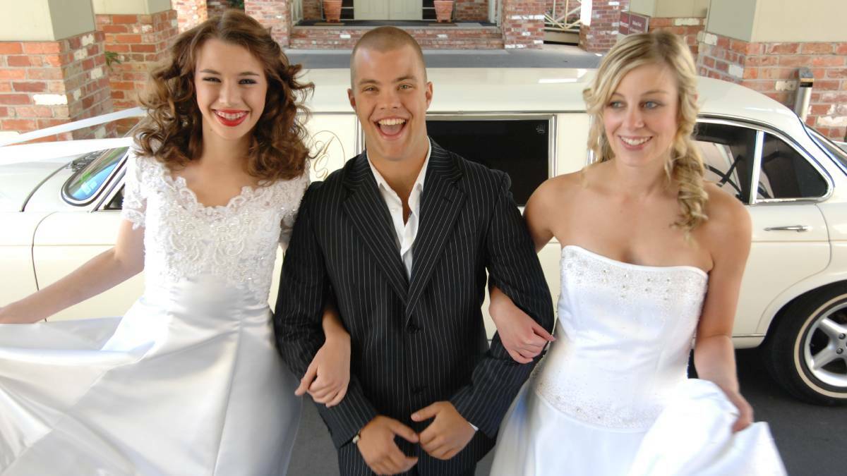2010 - Bridal Expo models Libby McKew, 15, Jack Terrill, 18 and Kate Peldys, 18, on their way to the expo.