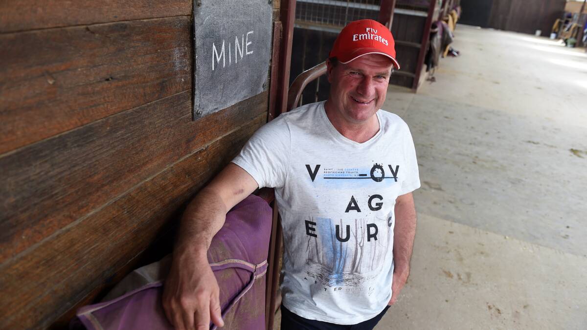 STILL SMILING: Darren Weir relaxes at Forest Lodge in Ballarat on Wednesday after celebrating his Melbourne Cup success with Prince of Penzance. Picture: Lachlan Bence.