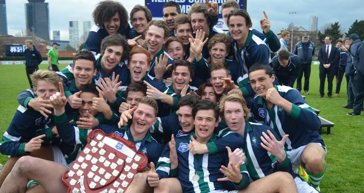 VICTORY: St Patrick's College celebrates its sixth straight herald Sun Shield. The college reasserted its unbeatable status with a 29-point victory over Essendon Keilor College.