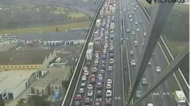 A crash between a truck and motorcycle has closed the West Gate Bridge this morning with traffic diverting at Williamstown Road. Photo: VicRoads.