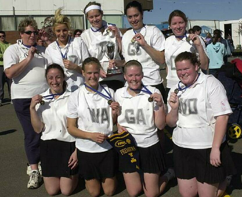Christine Hill (back row, far right) after the 2002 A-grade premiership with Clunes.