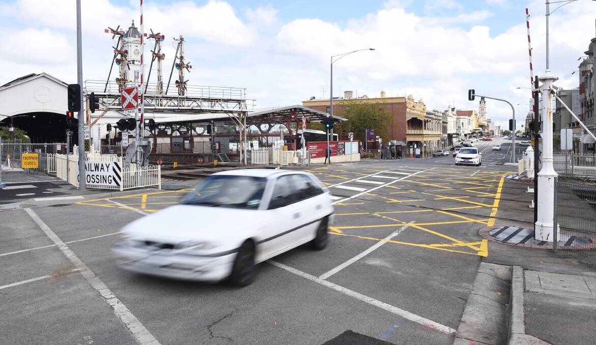 Traffic finally flowing across the Lydiard Street level crossing for the first time since May 30, 2020. Photo: Adam Trafford.