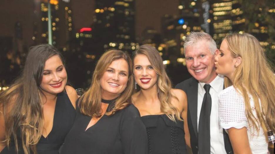 Danny Frawley with his wife Anita and their three daughters, Chelsea, Danielle and Keeley.