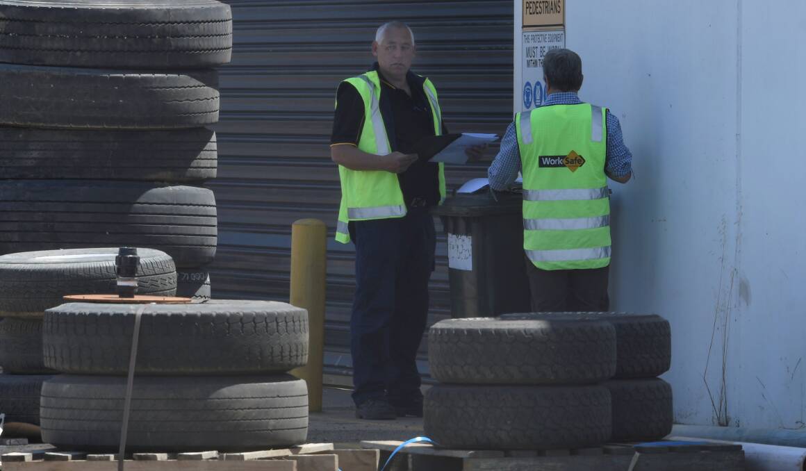 WorkSafe inspectors on scene at the Pipecon premises on Wednesday. Photo: Lachlan Bence.