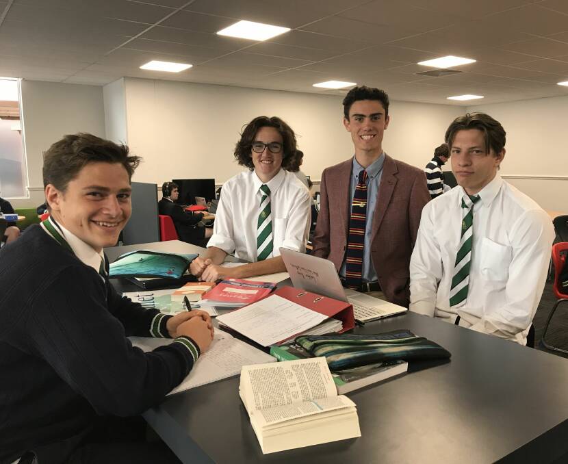 STUDY TIME: Year 12 students Cooper Craig-Peters, Ethan Kennedy, tutor Sam Williams and Lachie Arnts in the new St Patrick's College year 12 study centre which is staffed by tutors selected from last year's high achievers. Picture: Michelle Smith