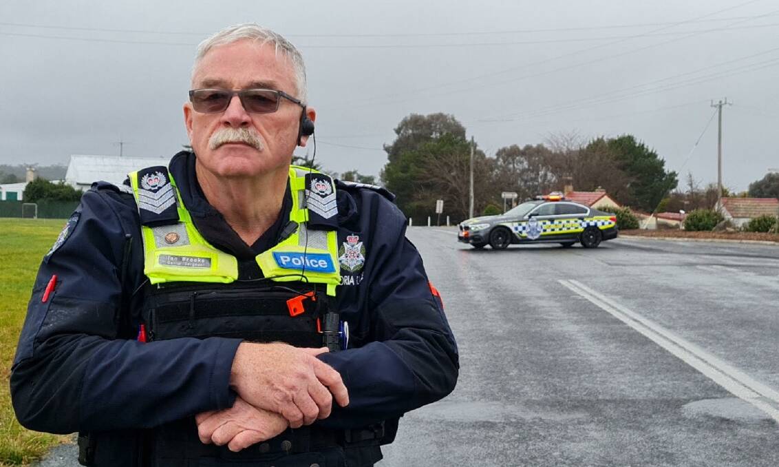 Senior Sergeant Ian Brooks of Goldfields Highway Patrol at the police road block. Picture: Gabrielle Hodson.