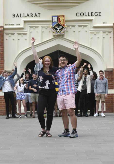 Ballarat Clarendon College duxes Olivia Putland and Yang Liu celebrate with their high achieving classmates. Picture: Lachlan Bence