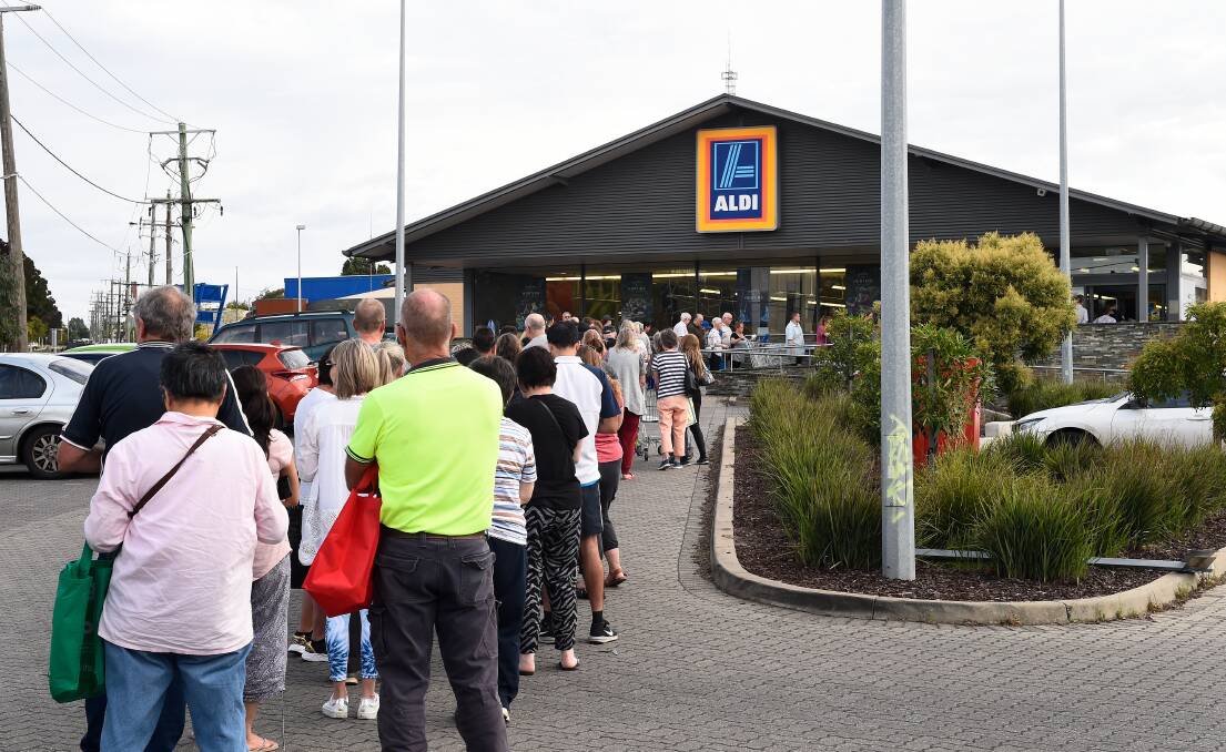Long queue's extending outside Aldi in Ballarat when panic-buying set in at the start of the pandemic in March.