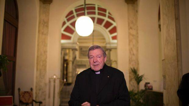 Cardinal George Pell talks to the press after giving evidence to the Royal Commission into Institutional Responses to Child Sexual Abuse in March 2016. Photo: Getty Images.