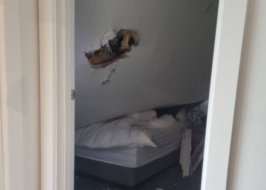 The ceiling collapsed on the bed where Ms Walmsley was sleeping.