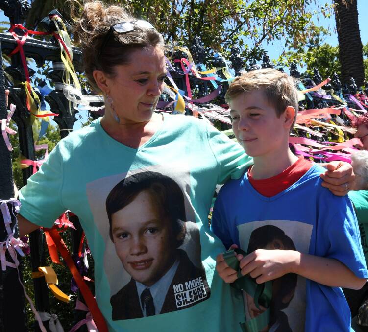 Clare Linane and Max Blenkiron (wearing t-shirts with Peter's face on them) at a Loud Fence event in Ballarat in February.