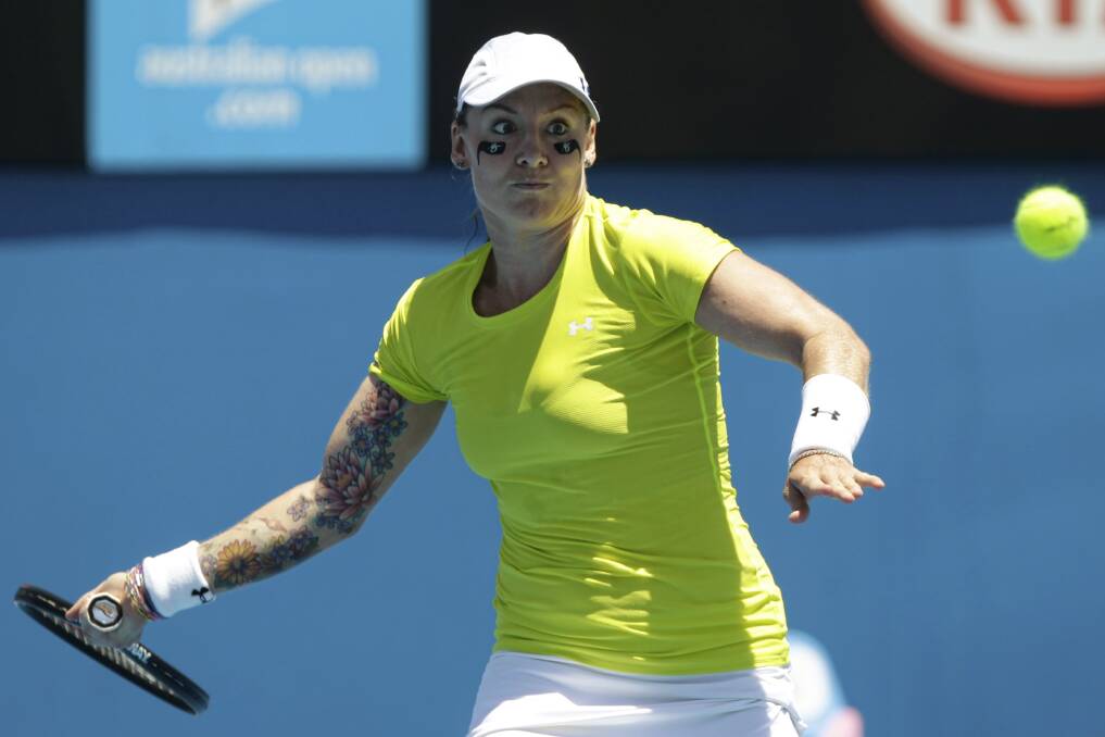 American Bethanie Mattek-Sands displays her floral tattoo on her arm and eye black under her eyes in 2012.