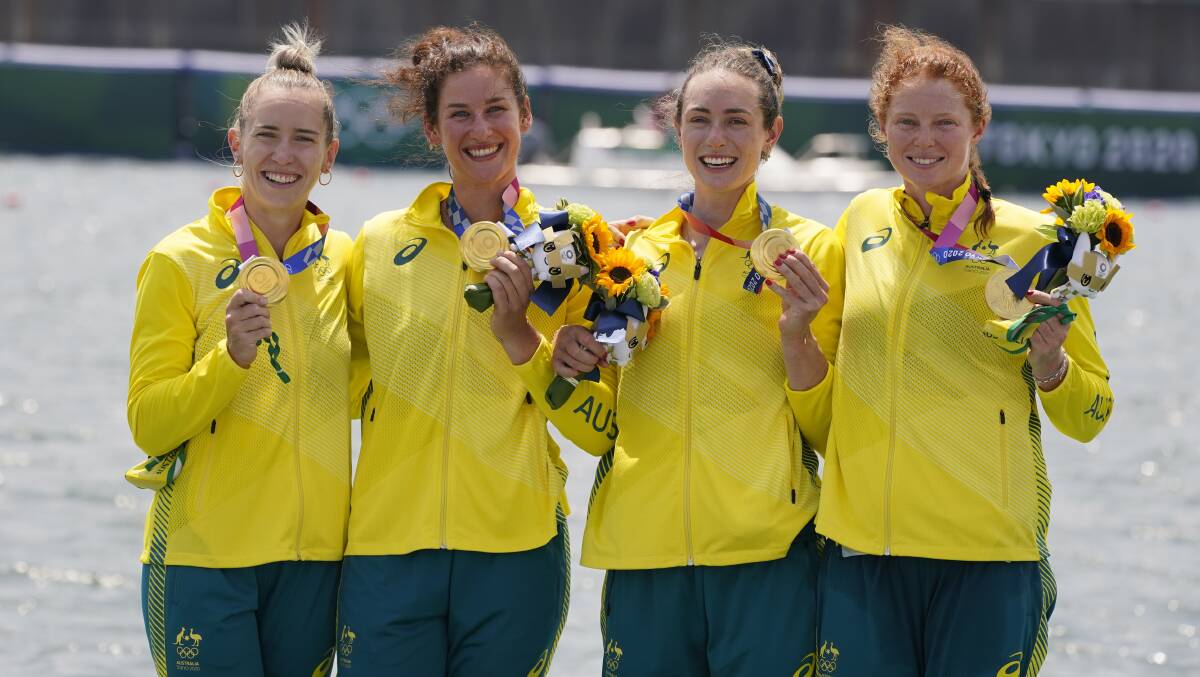 Lucy Stephan (left), Rosemary Popa, Jessica Morrison, Annabelle McIntyre pose with their gold medals. Photo: Darron Cummings/AP.