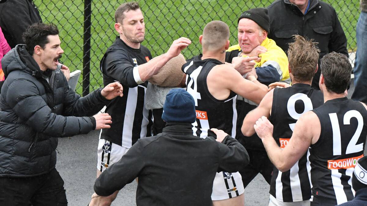 The brawl that broke out between a supporter and Darley players. Photo: Lachlan Bence.