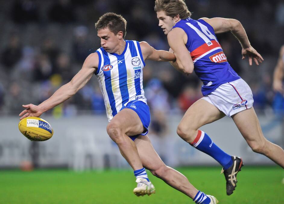 Ben Speight playing for North Melbourne in 2011.