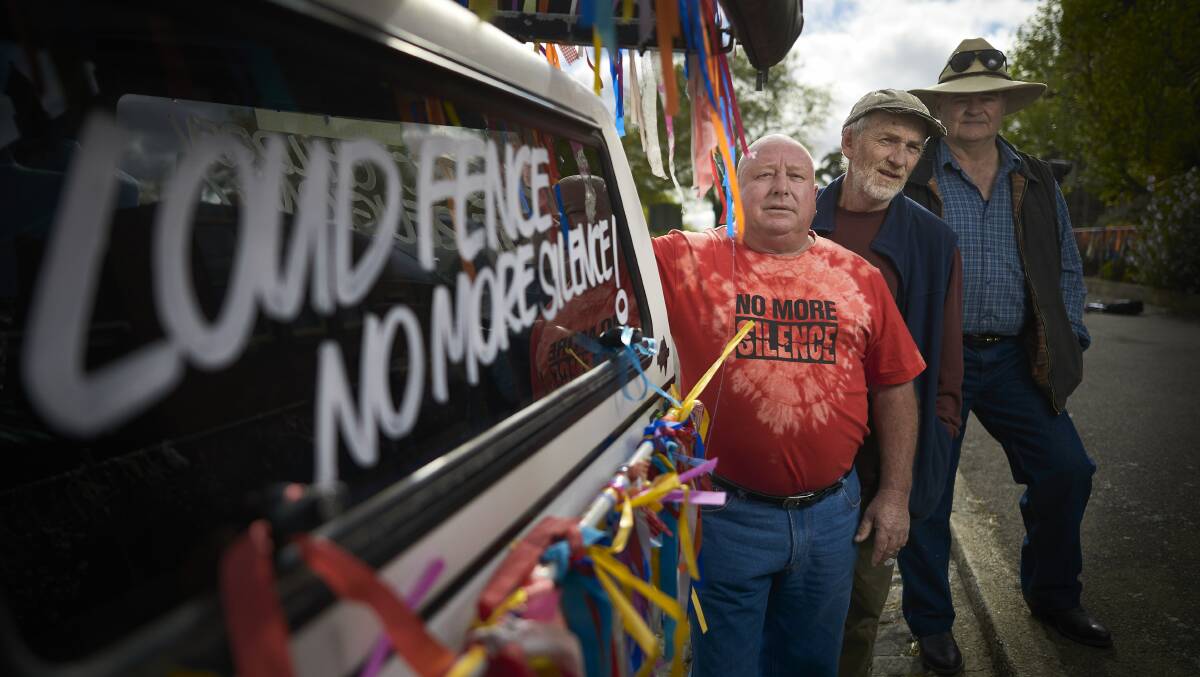 Abuse survivors Tony Wardley, Paul Auchettl and Gerard Morrow with the ute Tony will drive to Canberra to protest the national apology. Picture: Luka Kauzlaric.