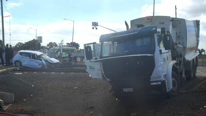 The car and truck involved in the incident. Photo: 9 News.