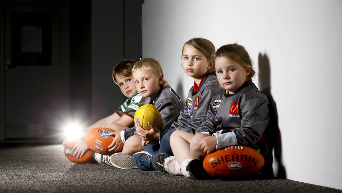 UPSET: Jackson Davies (10), Jude Watson (7), Chloe Nicol (10) and Millie Liversage (7) had hoped they would be able to play footy for Woady Yaloak next year. Picture: Luke Hemer.