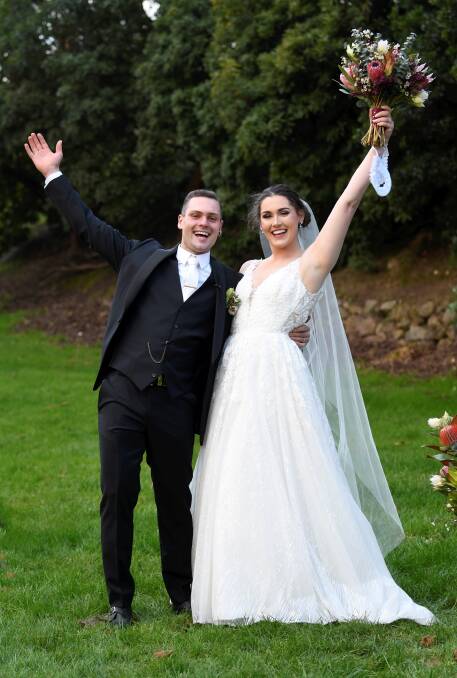  HAPPY: Jake Rogers and Kaitlyn Cartledge tied the knot the Buninyong Botanic Gardens just hours after learning Ballarat would enter another lockdown. Picture: Lachlan Bence