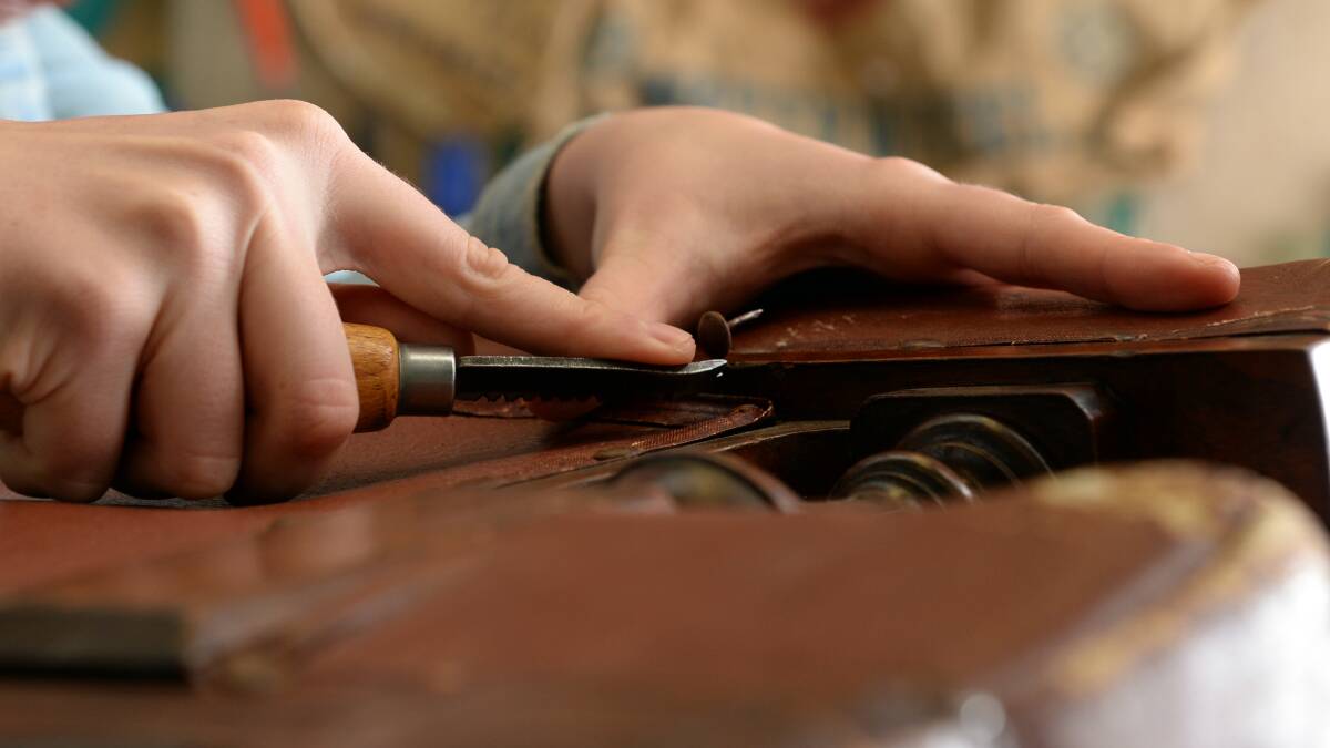 WORK: Ms Teed handcrafting her latest piece. Picture: Kate Healy