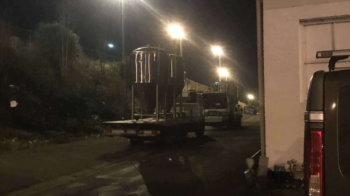 Removed: brewing vats loaded onto Sheriff's Office contracted lorries on Thursday night.