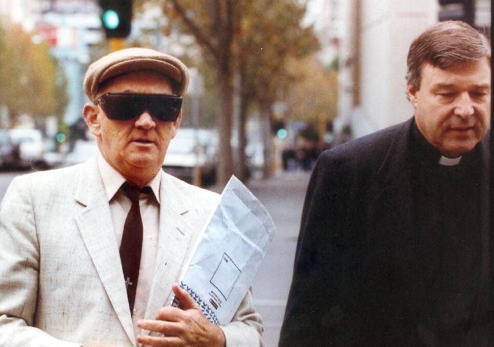 George Pell accompanying notorious paedophile Gerald Ridsdale to court in 1993.