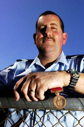 Peter Anderson with his Bravery Medal that was presented in 2005.
