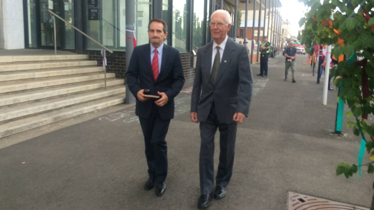 AUTHORISED FUNDING: Truth, Justice and Healing Council CEO Francis Sullivan leaves the Ballarat Magistrates' Court with Christian Brother Brian Brandon who authorised payments for an investigator to track down victims. 