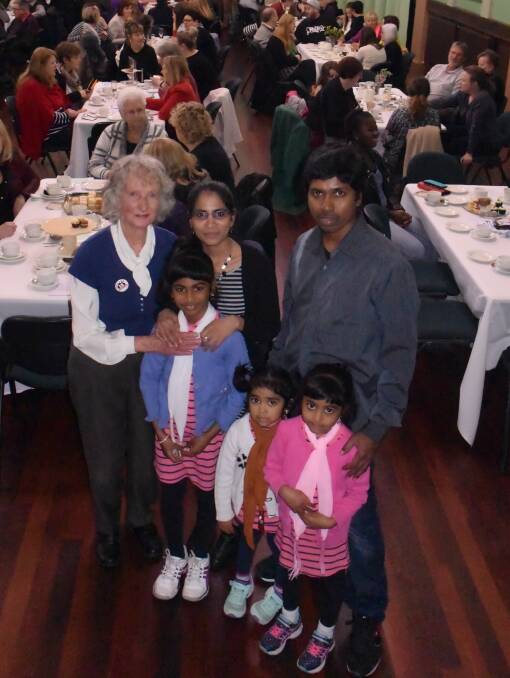 IN LIMBO: Event organiser Kath Morton (far left) with Neelavannan Para and his wife Suganthini with their daughters (left to right) Nivash, 8, Niev, 3, and Kartie, 6. 