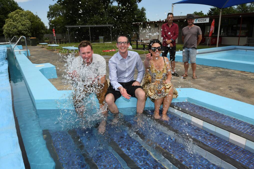 Buninyong Community Pool Committee's Simon Coghlan, and Phoebe Vandeleur with Ballarat City councillor Ben Taylor. Picture: Lachlan Bence