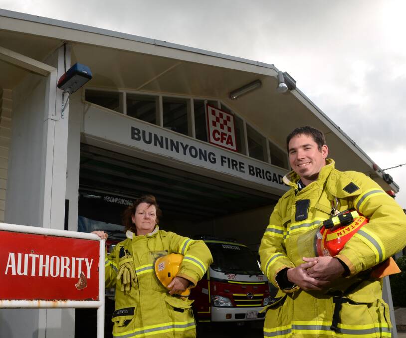 Buninyong fire brigade members Chris Jervies and Marc Cannan shortly after the announcement was made by the government last year. 