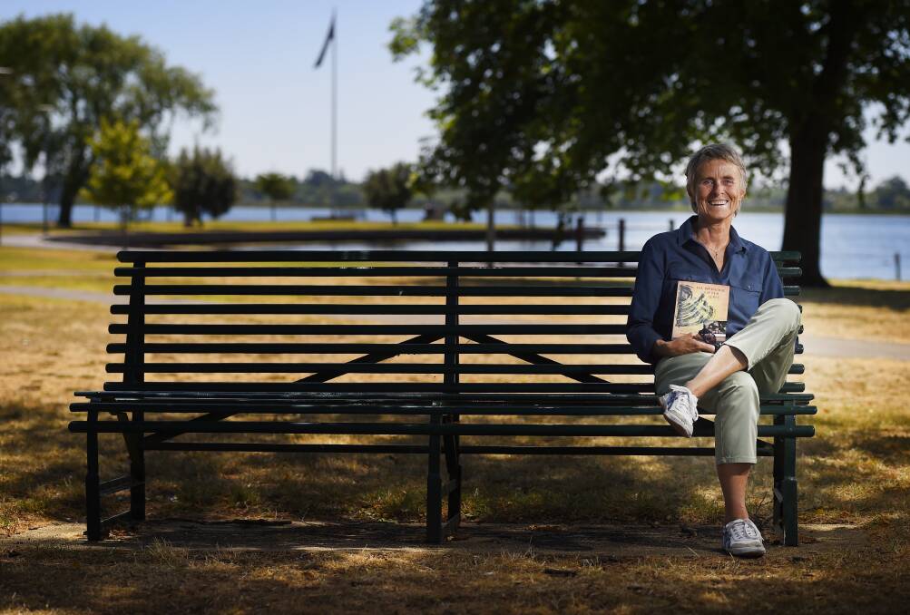 HUMBLE: Sister Trish Franklin with her biography during a recent visit to Ballarat. Picture: Luka Kauzlaric.