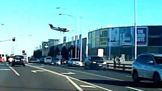 The plane narrowly missed a busy freeway before crashing into Essendon DFO, killing all five people on board.
