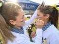 Abby Blee and Edie Folkei in the Loreto College spit crew. Picture by Lachlan Bence. To buy this photo, email syndication@austcommunitymedia.com.au