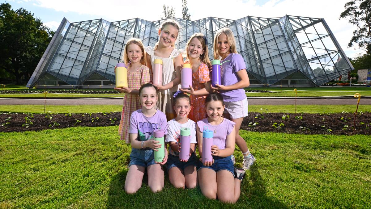 From left at back: Madeline, Ella, Charlotte, Ginger. Front - Sofia, Alessia and Taya, with Frank Green drink bottles. Picture by Adam Trafford. 