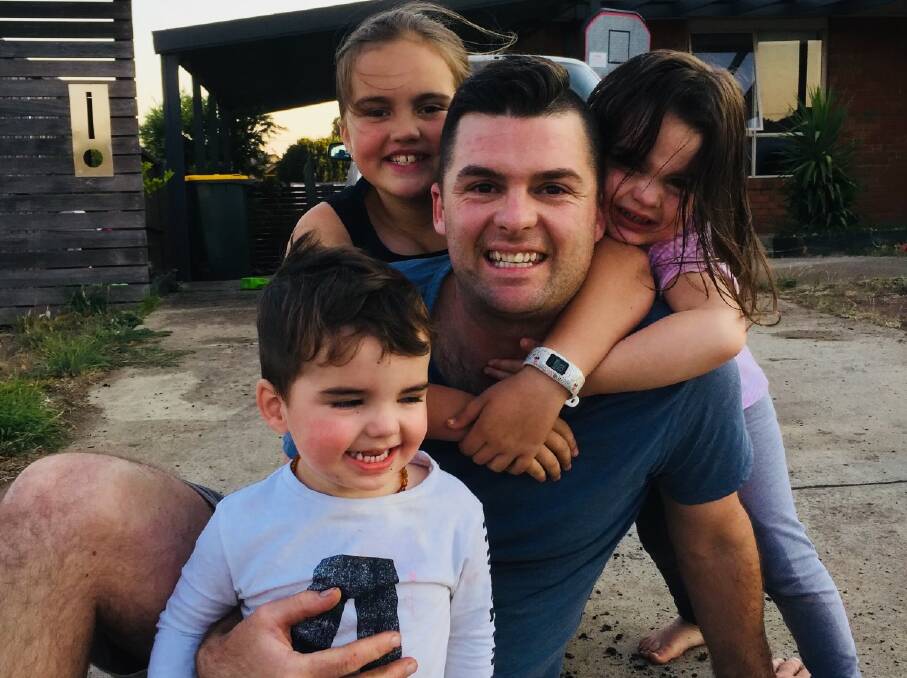 Adam Bridges with his children, Layla, Emmie and Alfie. Picture supplied. 