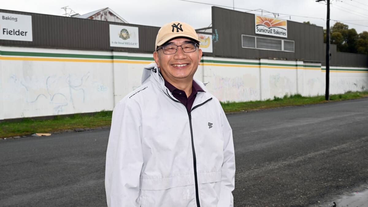 Jason Chen, shop manager, outside the former Sunicrust factory in Lal Lal Street. Picture by Kate Healy. 