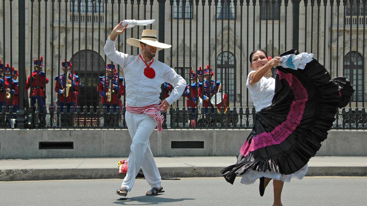 Exotic South America … dancers in front of government palace in Lima. 