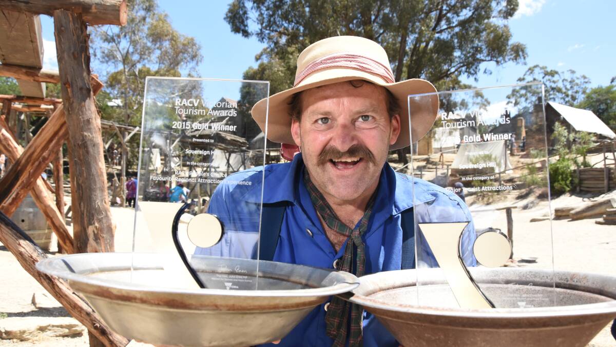 BONANZA: Miner Anthony Geurts digs up some gold after Sovereign Hill won two awards at the RACV Victorian Tourism Awards on Monday night.  PICTURE: Jeremy Bannister