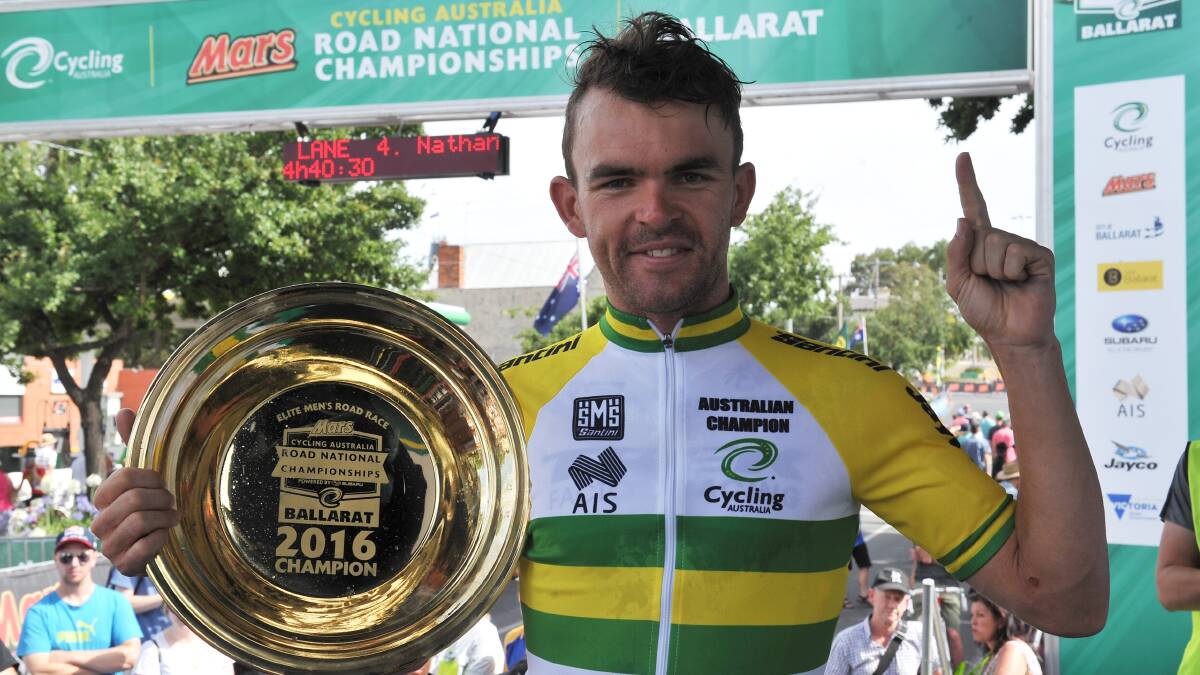 Men's road race winner Jack Bobridge with the jersey after his staggering victory. PICTURE: Lachlan Bence