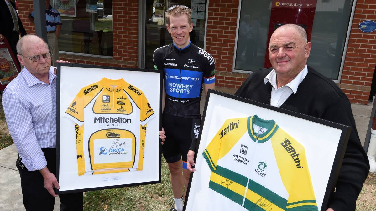 Winners John Coull and Ken Edwards with cyclist Pat Shaw. PICTURE: Lachlan Bence
