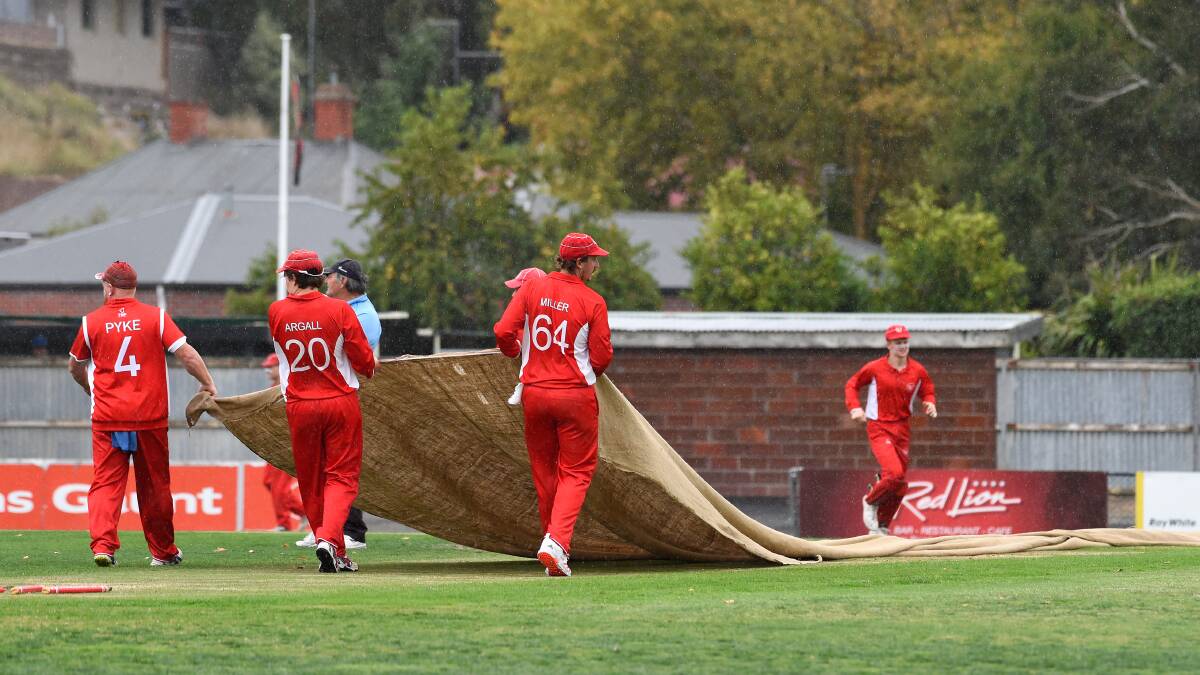 The covers are coming on across Ballarat as the predicted rain band arrives on time, distrupting sport. 