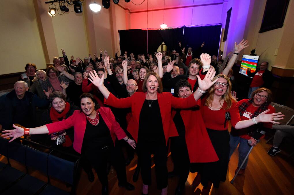 RETURNED: Catherine King celebrates with the party faithful at Trades Hall not only after comfortably holding the seat but as Labor pulls ahead in key seats in WA. 