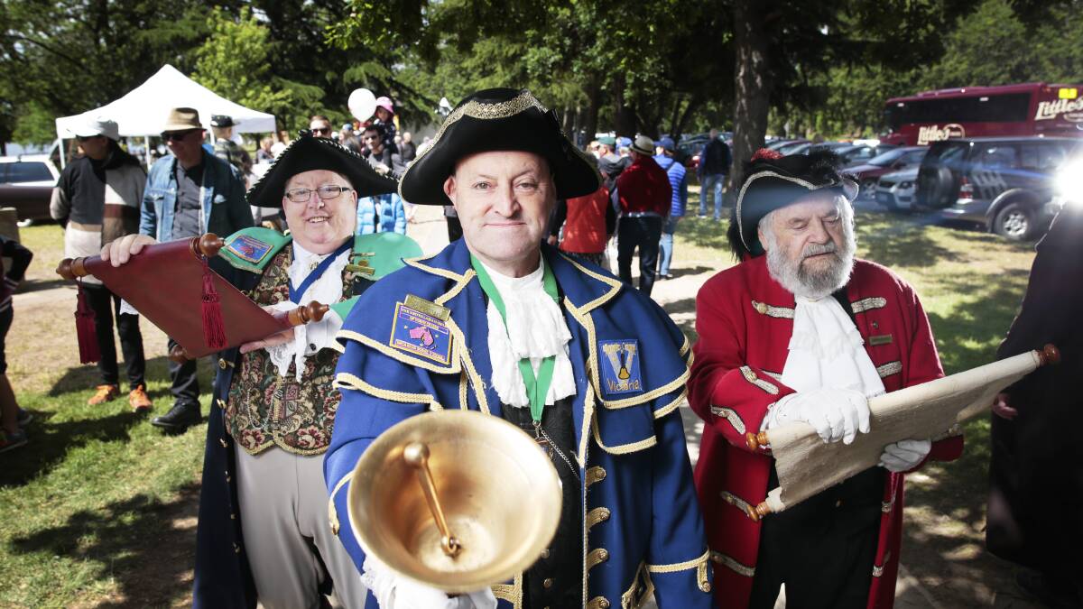 Town Criers Gavin Barker, Philip Greenbank and Brian Whykes at the 2016 Springfest event around Lake Wendouree. Picture: Luka Kauzlaric